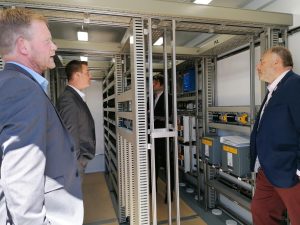Network Rail's Stuart Calvert and Dan Holder inside a Relocation Equipment Building fitted out by RSP