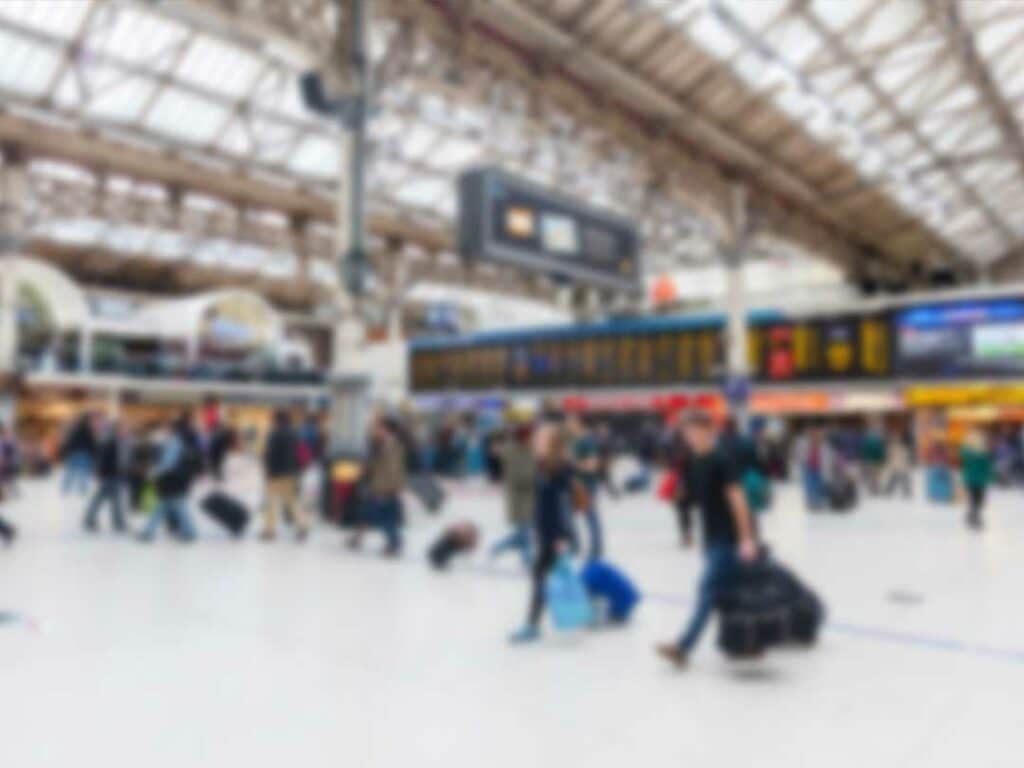 Crowded railway station showing the need to increase capacity and improve digital technologies